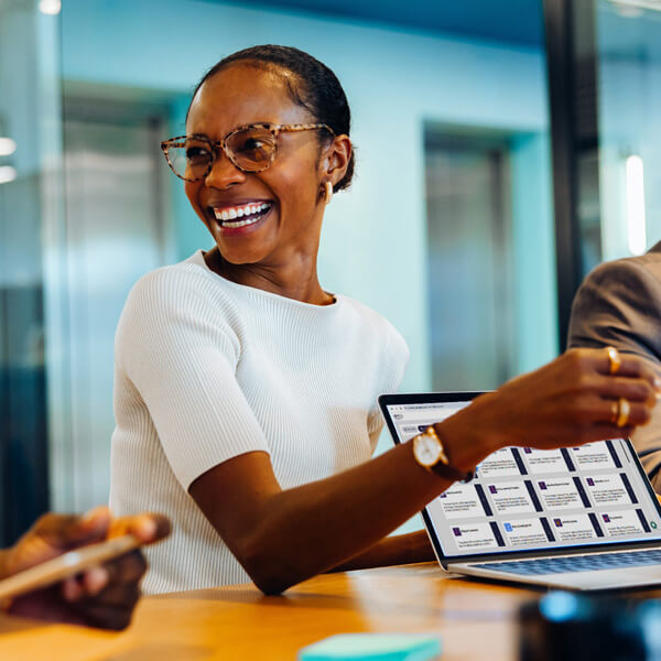 Folks at a meeting at a table